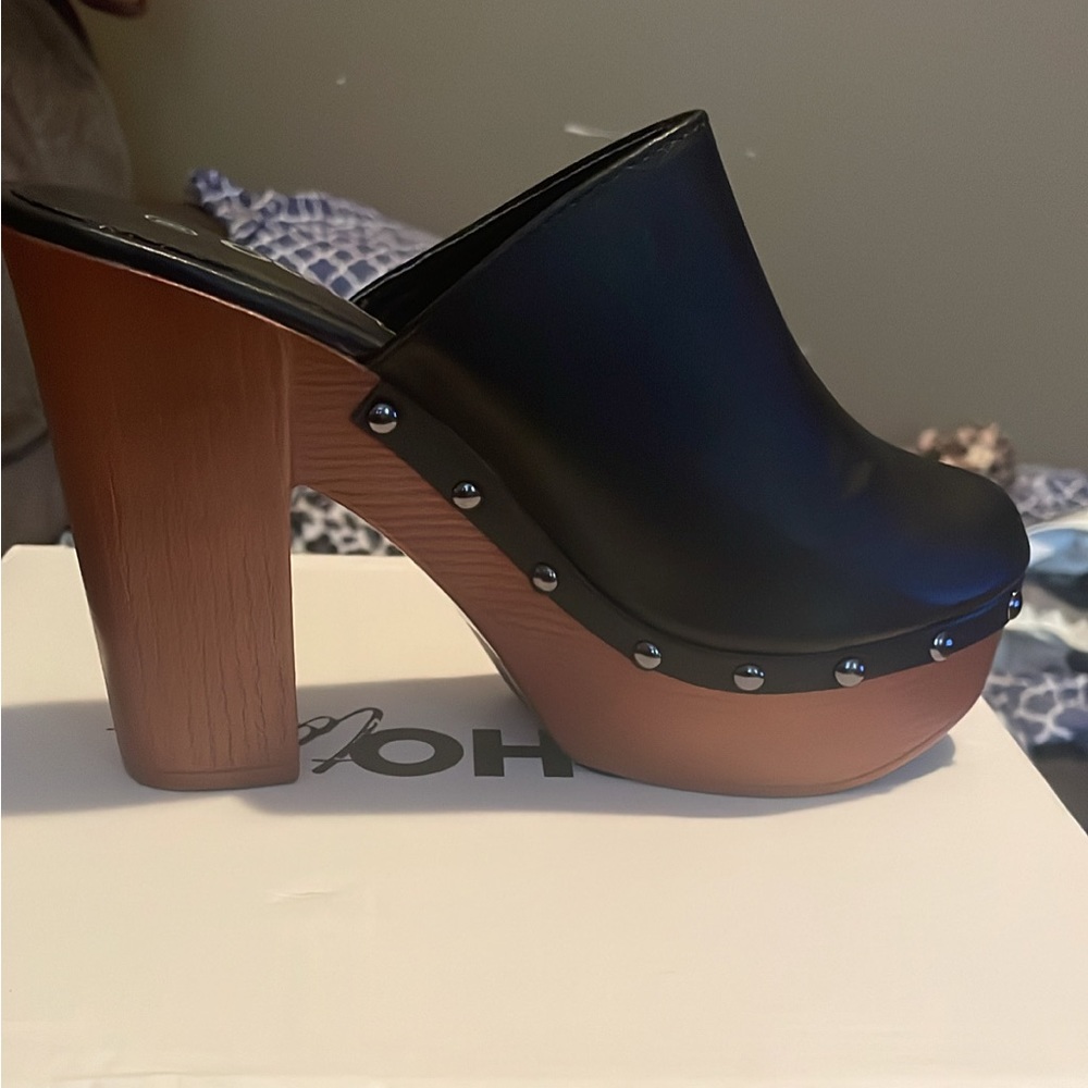 Ocho Toros Studded Platform Clogs.